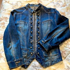 Form fitting Jean jacket with lots of detail. Like new